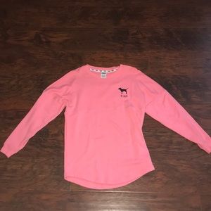 Pink thick long sleeved sweater.